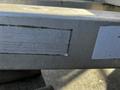 Close-up of a metal plate on a 2014 Express 8 Foot Trailer displaying compliance and manufacturer information