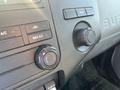 Close-up of climate control knobs and buttons in a 2015 Ford F-450 SD interior