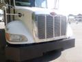 A front view of a 2008 Peterbilt PB340 truck showcasing its chrome grille and prominent logo