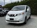 A 2020 Nissan NV200 van with a white exterior featuring a distinctive front grille and multi-spoke alloy wheels