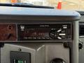 A Delphi radio unit with Bluetooth capability displaying the channel number CH1 in a 2009 Kenworth T270 truck interior