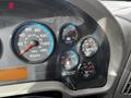 The dashboard of a 2008 International 7500 featuring various gauges including speedometer fuel gauge voltmeter and air pressure gauge