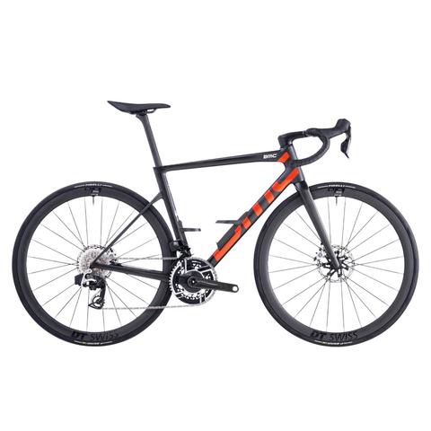 2026 BMC Teammachine SLR 01 ONE Carbon Performance Race Road Bike featuring a sleek design with black and orange accents and disc brakes