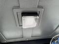 Interior view of a ceiling light fixture in a 2024 AGT Industrial Yellow H13R Mini Excavator