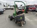 A 2009 John Deere 2653B Precision grass cutting machine with a green frame and black seat visible from the back