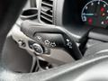 The image shows the turn signal and headlight controls on the steering column of a 2022 Ford Transit