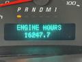 A digital display showing the text ENGINE HOURS with a reading of 16247.7