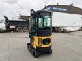 2024 AGT Industrial Yellow H13R Mini Excavator with a cab and tracks designed for small excavation tasks