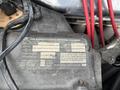 A 1970 Chevrolet Corvette with a close-up view of an air conditioning service record label showing details like address and service date