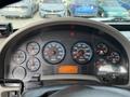 Dashboard of a 2008 International 4300 displaying various gauges including RPM speedometer fuel gauge and warning lights