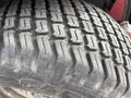 Close-up of a tire tread pattern from a 2012 Toro Groundsmaster 5910 showing deep grooves designed for traction on turf and uneven surfaces