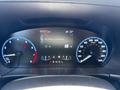 Dashboard of a 2023 Ford Bronco Sport displaying speedometer fuel gauge and digital screen indicating distance temperature and connectivity status