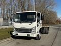 A white 2017 Isuzu NQR truck with a flatbed and distinctive Isuzu branding on the front