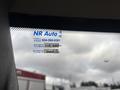 2022 GMC Savana with a service sticker showing next service date and mileage details