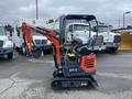 A 2025 AGT Industrial mini excavator with a red boom arm, tracks, and a compact design for construction and landscaping tasks