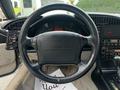Interior view of a 1992 Chevrolet Corvette showing the steering wheel dashboard and control panel