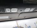Interior ceiling controls and lights of a 2020 Freightliner 114SD truck