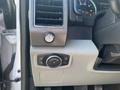 Dashboard controls of a 2017 Ford F-150 including air vent switch and headlight control knobs