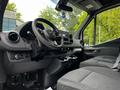Interior view of a 2020 Mercedes-Benz Sprinter showing the driver's seat dashboard and steering wheel with modern controls and a spacious cabin design