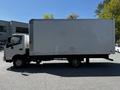 2020 Hino 155 box truck with a white cargo area and a cab visible on the left side of the image