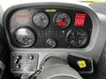 Dashboard of a 2009 Spartan Gladiator featuring various gauges and switches including speedometer tachometer and warning lights