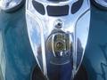 Close-up view of the chrome fuel cap and ignition switch on a 2009 Harley-Davidson FLSTC motorcycle