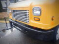 2008 Freightliner MT45 Chassis with a bright yellow front, featuring a prominent grill design and two headlights on either side