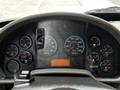 Dashboard of a 2019 International 4300 displaying various gauges including speedometer, RPM, fuel level, and warning lights