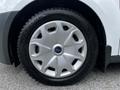 Close-up of a silver alloy wheel from a 2016 Ford Transit Connect featuring a distinct five-spoke design and a black tire with tread visible