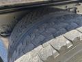 Close-up of a large tire from a 2018 International DuraStar showcasing the tread pattern and textured surface