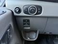 The image shows the interior dashboard controls of a 2022 Ford Transit including a dial for lights and a switch for pulling features