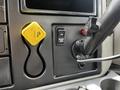 The image shows the dashboard of a 2019 International 4300 with a yellow brake release knob a switch labeled ON and a circular power socket