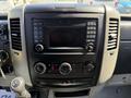 Dashboard controls of a 2017 Mercedes-Benz Sprinter featuring a central display audio system and climate controls