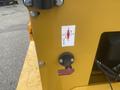 Close-up of a 2024 AGT KRW 23 Mini loader featuring a labeled control dial and a valve with a purple handle for adjusting functionality