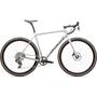 2025 Specialized Crux Expert Carbon gravel bike with a sleek white frame and orange-treaded tires designed for off-road riding and versatile performance