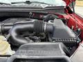 A close-up view of the engine of a 2019 Ford F-150 showcasing the air intake and surrounding components