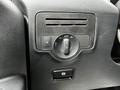 Close-up of the control panel in a 2023 Mercedes-Benz Metris featuring dials for climate control and light settings
