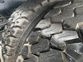 Close-up of rugged tires on a 2014 RAM 5500 showcasing deep treads designed for off-road traction and durability