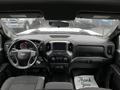 Interior view of a 2021 Chevrolet Silverado 3500HD showcasing the dashboard steering wheel and center console with a touchscreen display