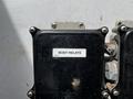 A black electrical relay box labeled "BODY RELAYS" with visible screws and a clean design