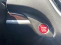 Close-up of a red engine start stop button in a 2017 Acura TLX interior
