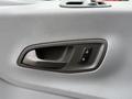 Interior door handle and lock controls of a 2017 Ford Transit