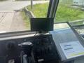 Dashboard of a 2007 Morgan Olson Workhorse W42 showing a display screen gear shifter and various control switches