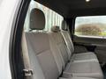 Interior view of the backseat of a 2017 Ford F-350 SD with cloth seats in gray and headrests visible on each seat