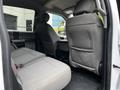Interior view of a 2020 Ford F-350 SD showing rear seats with gray upholstery and a spacious cabin layout