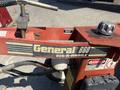 Close-up view of a General 660H Dig-R-Mobile auger featuring a red metal frame with black and yellow branding
