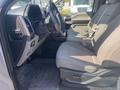 Interior view of a 2017 Ford F-150 showing the front seats and steering wheel with a focus on the dashboard and control panel