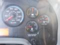 Dashboard of a 2014 International Durastar displaying speedometer tachometer and various gauges for volts fuel and air pressure