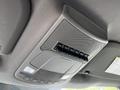 Interior overhead console of a 2017 Ford F-250 featuring buttons and speaker grill
