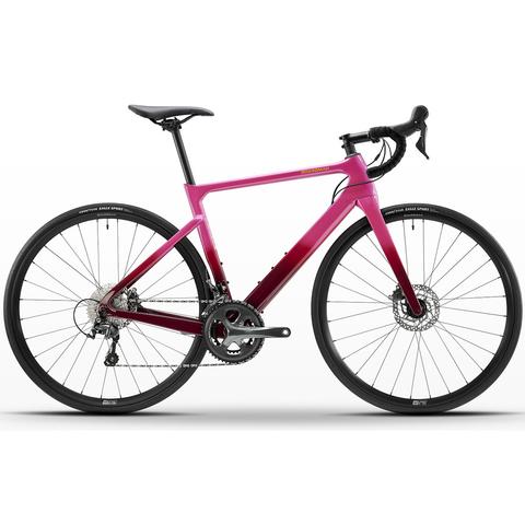 A 2026 Boardman SLR 8.9 Carbon Road Race Womens Road Bike with a sleek design featuring a gradient pink color scheme and disc brakes